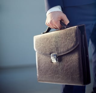 close-up-businessman-holding-briefcase